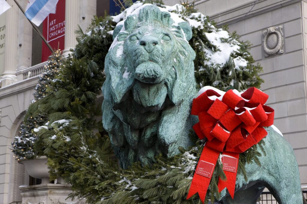 Holiday Vacation Destinations Statue of a lion at the Art Institute of Chicago.
