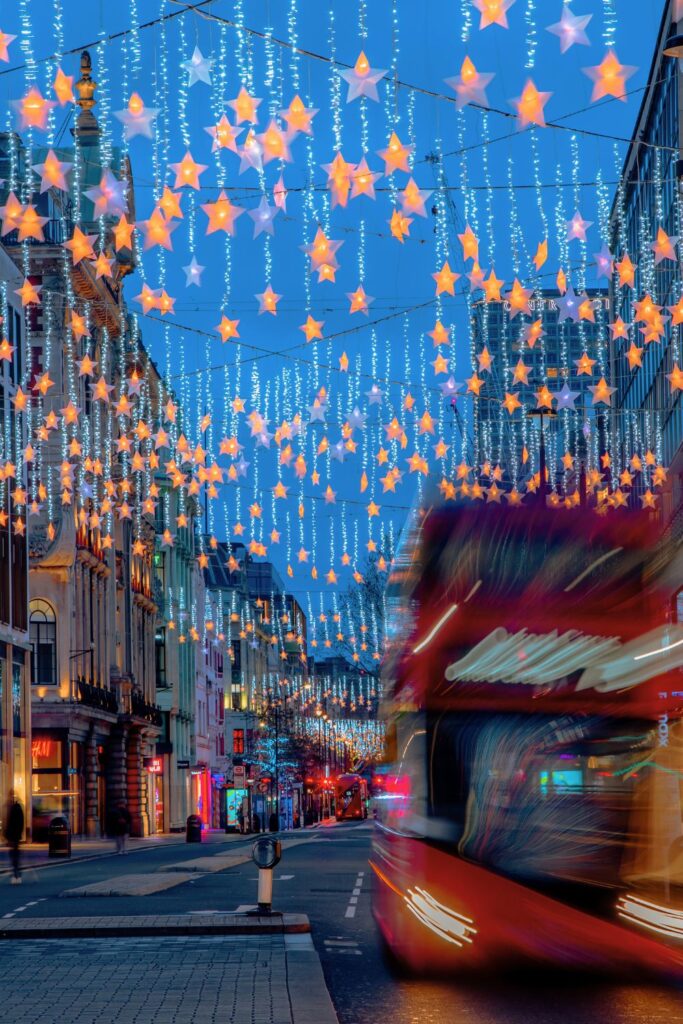 Holiday Vacation Destinations Festive sparkling lights in London at night.