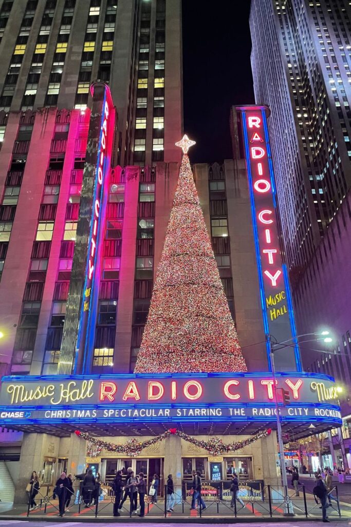 Holiday Vacation Destinations Night view of Central Park decorated for Christmas.