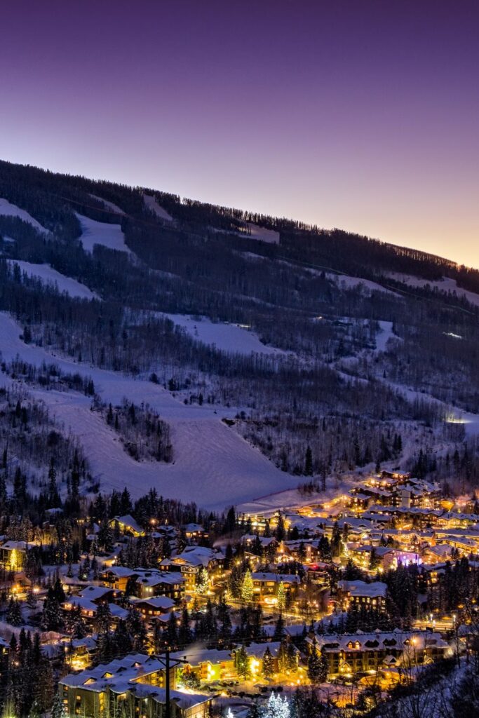 Holiday Vacation Destinations Mountain views and festive decor in Vail Village, Colorado