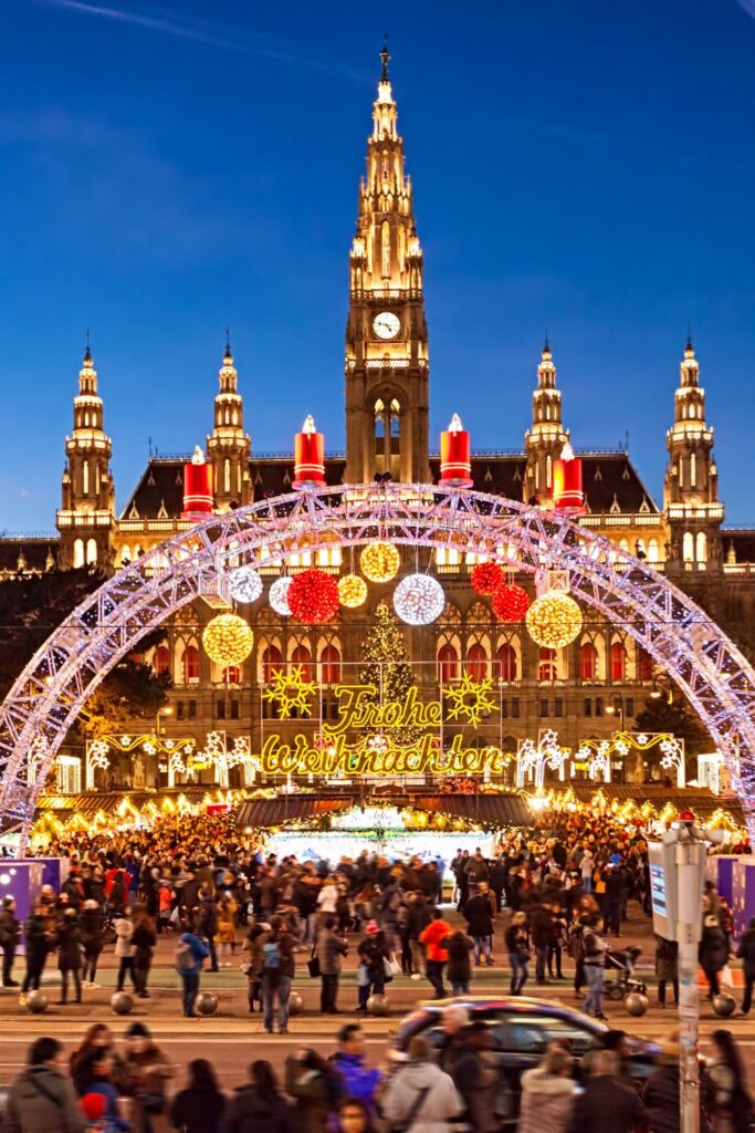 Holiday Vacation Destinations People enjoying the Christkindlmarkt in Vienna, Austria