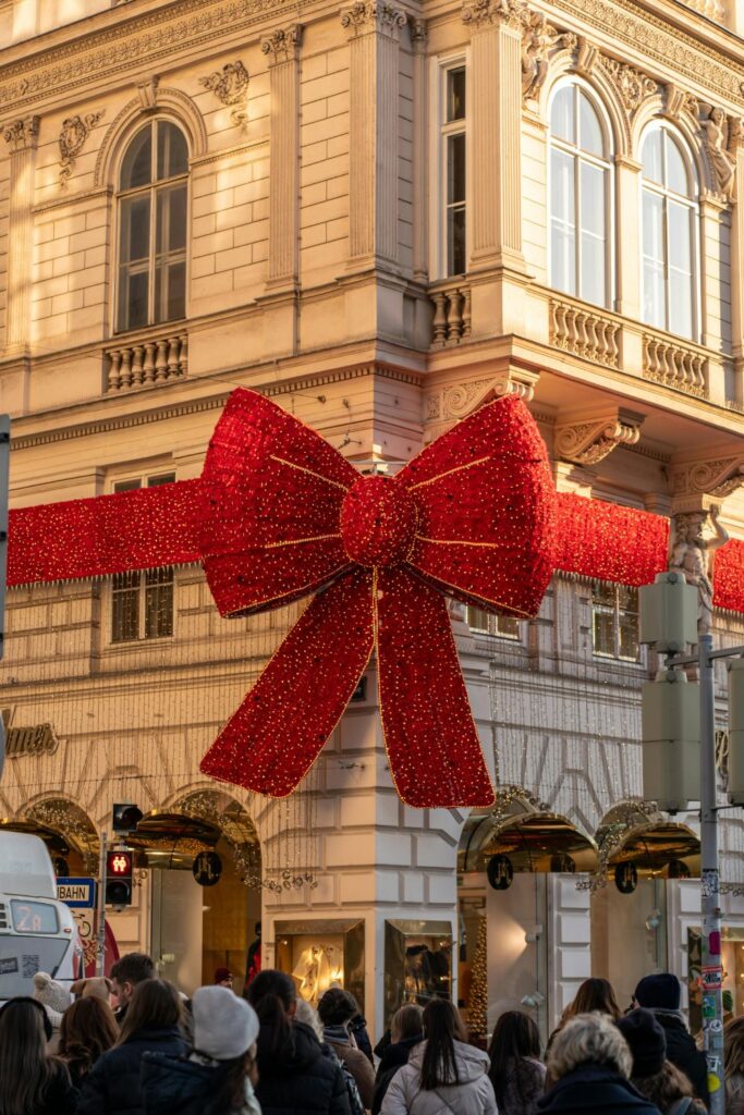 Holiday Vacation Destinations Giant Christmas bow on a building in Vienna, Austria.