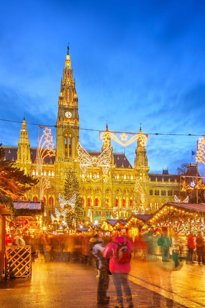 Holiday Vacation Destinations Christkindlmarkt in front of the Rathaus in Vienna, Austria, top holiday vacation destinations.