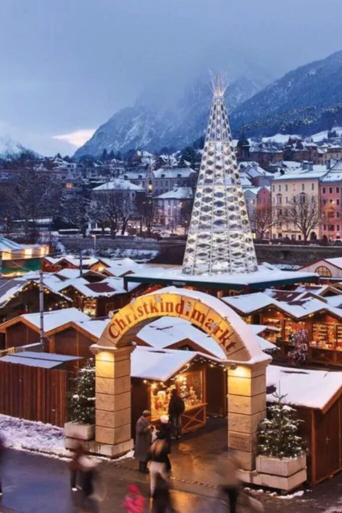 Old Town Christmas market in Innsbruck, Austria – places to travel during Christmas.
